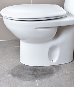 toilet leaking from base